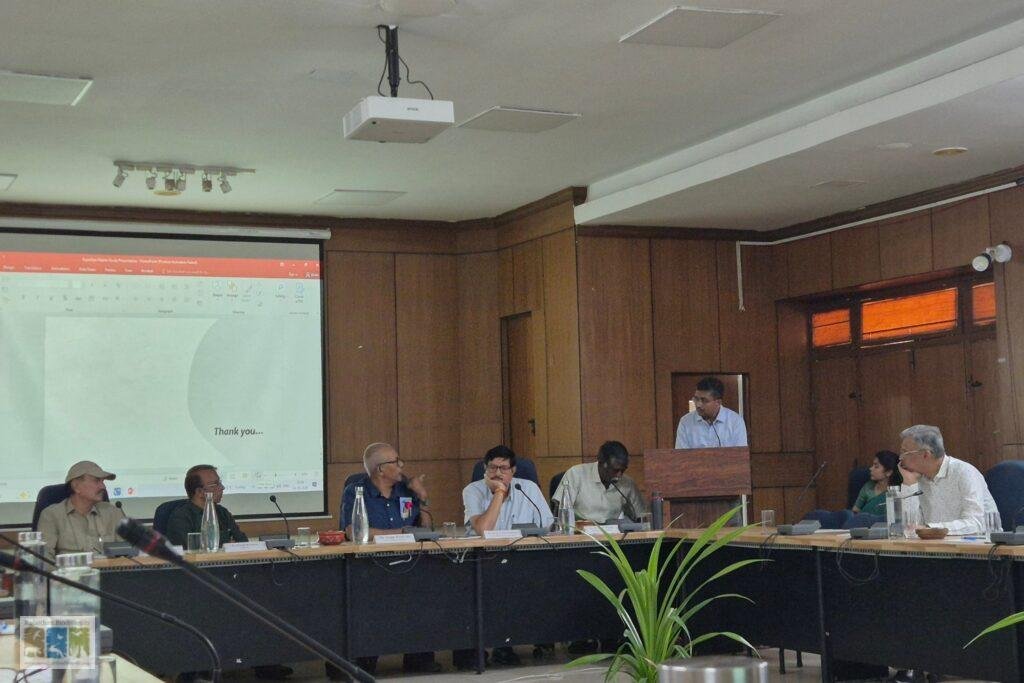 Shri Arijit Banerjee speaking from the table after the Rajasthan Raptor Project presentation
