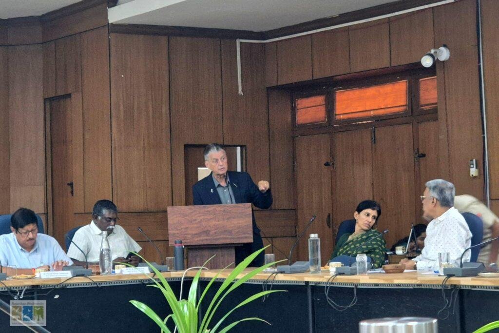 Dr Chris Bowden speaking at the podium during the Rajasthan Raptor Project inception meeting