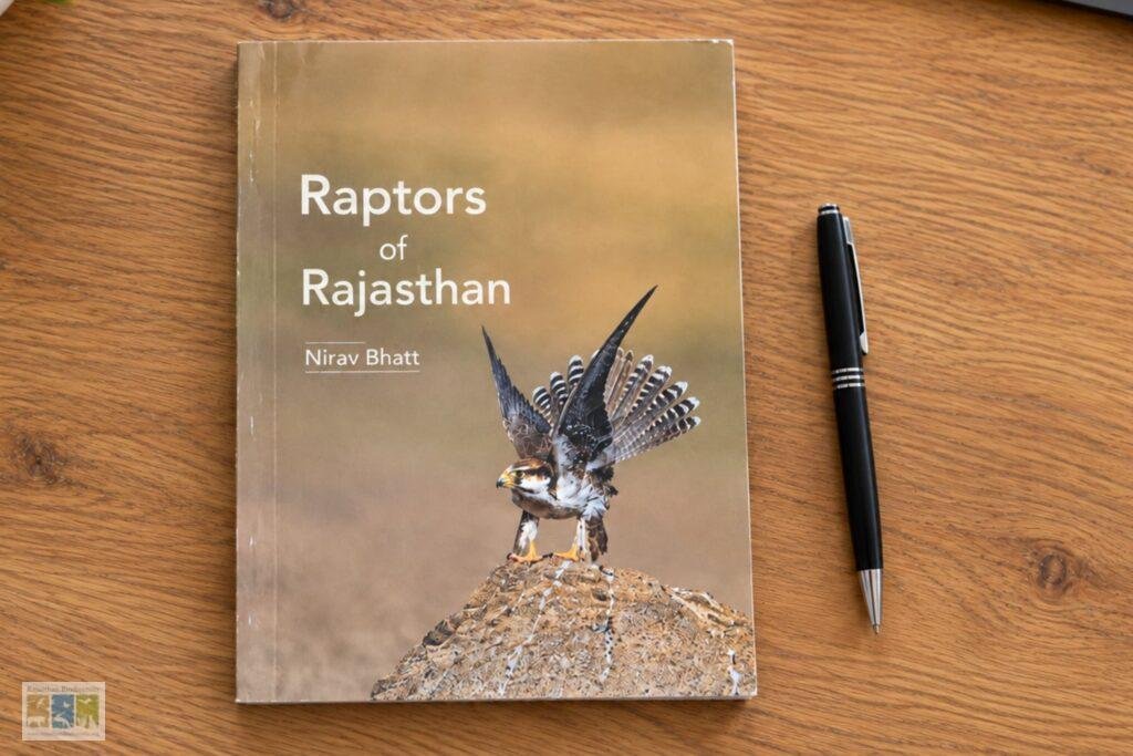 Cover of the book Raptors of Rajasthan by Nirav Bhatt, showing a falcon on a rock